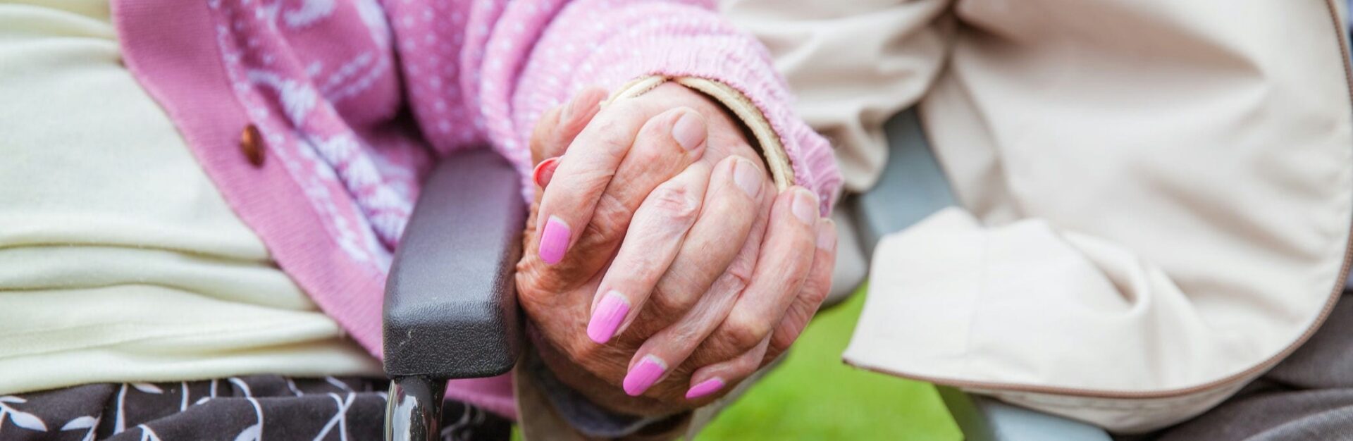 Woman holding hands and supporting each other